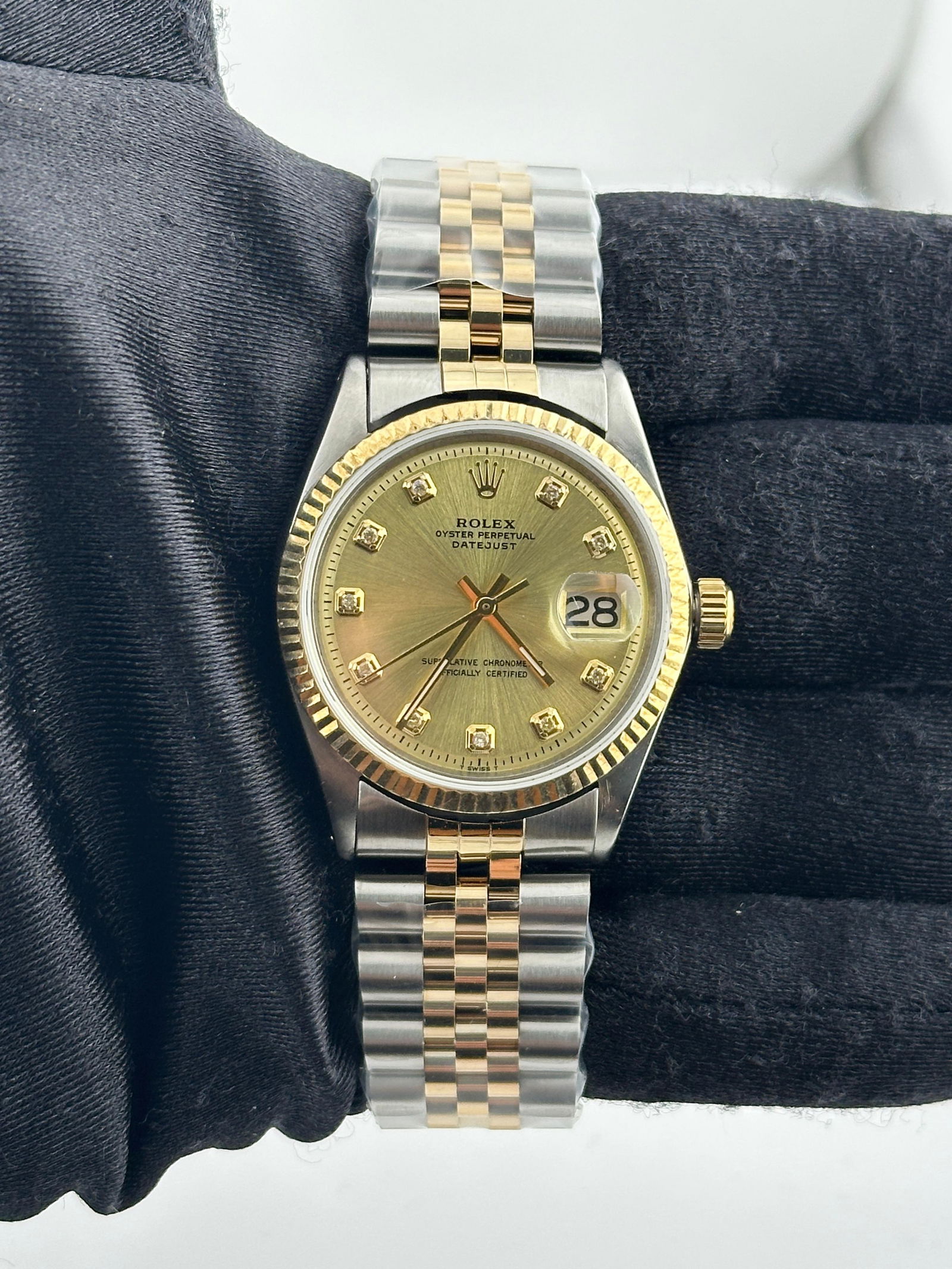 Rolex Datejust 1603 Champagne Diamond Dial Jubilee Bracelet: Rolex Datejust 1603 Champagne Diamond Dial Jubilee Bracelet Discover the timeless elegance of the Rolex Datejust, a distinguished watch designed for men. Featuring a stunning Aftermarket Champagne Dia