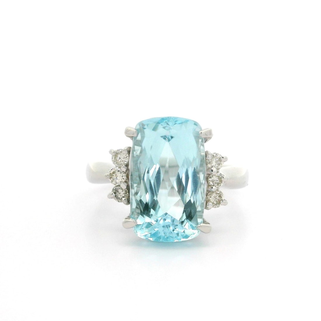 Stunning Platinum Ring 7.36ct Aquamarine with Diamond Accents: Stunning Platinum Ring 7.36ct Aquamarine with Diamond Accents Exemplifying elegance, this classic cocktail ring is crafted from solid platinum and features a stunning 7.36ctw cushion aquamarine at its