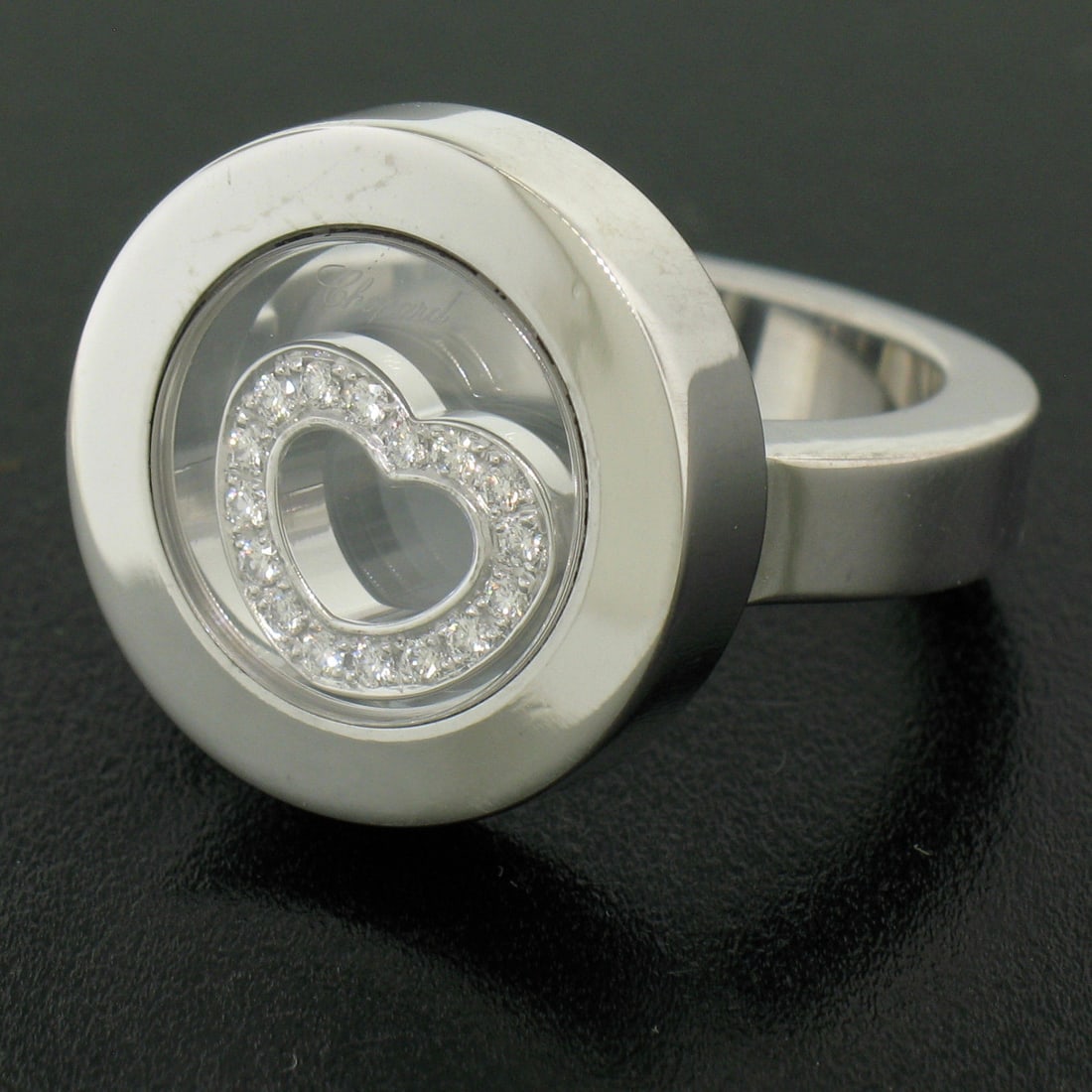 Chopard 18k White Gold Floating Diamond Heart Ring Size 6: Chopard 18k White Gold Floating Diamond Heart Ring Size 6 Introducing the Authentic Chopard 18k White Gold Floating Diamond Heart Heavy Happy Ladies Ring, a stunning cocktail-style piece that combines