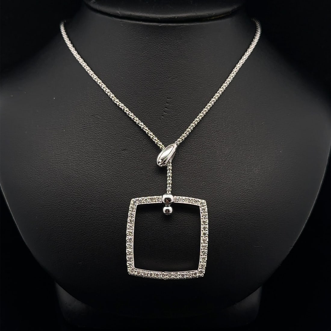 14k White Gold Diamond Lariat Necklace with Square Pendant: 14k White Gold Diamond Lariat Necklace with Square Pendant This stunning necklace features a square pendant adorned with 42 natural genuine diamonds, all in a round brilliant cut and pave set for maxi