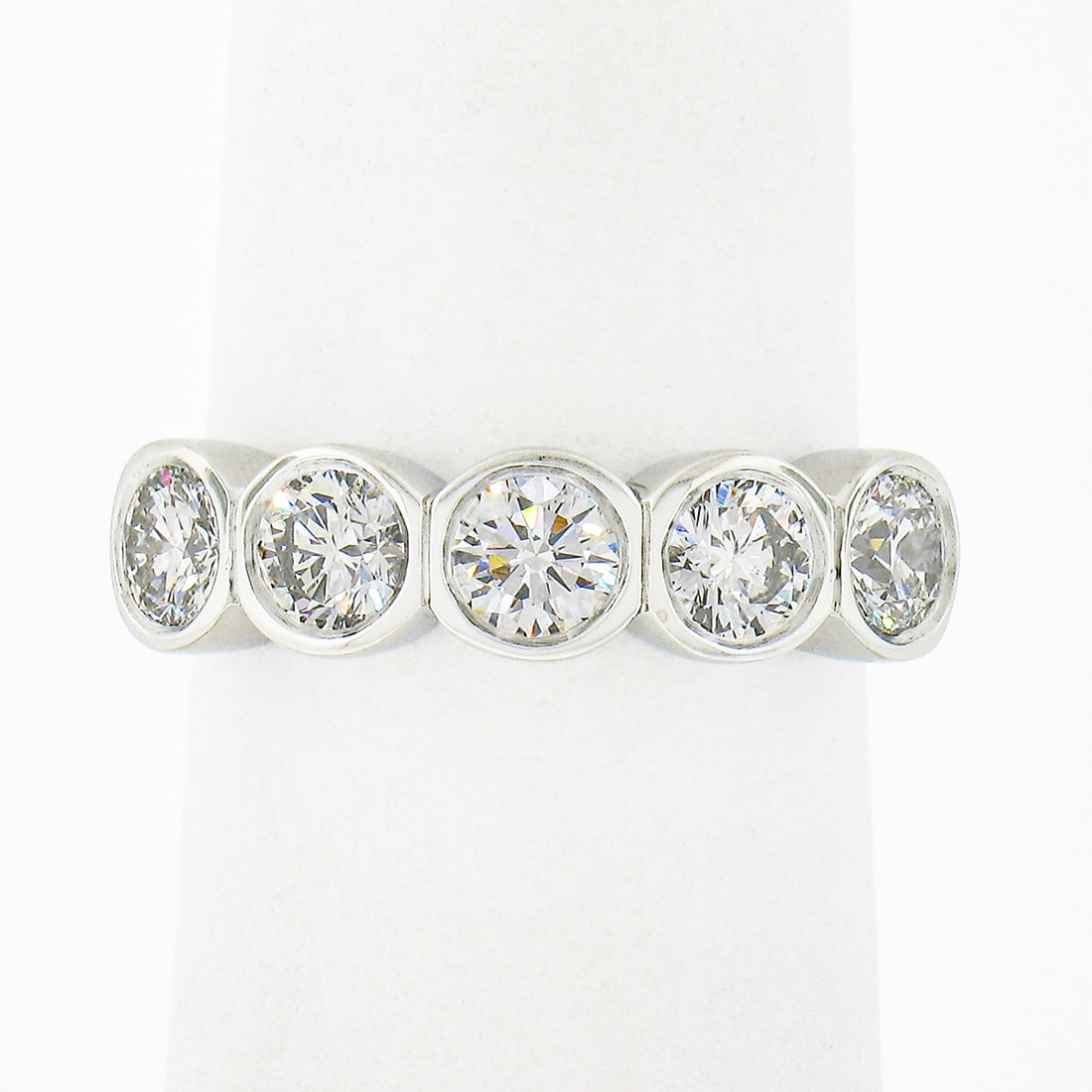 Custom Made Platinum 1.19ct Bezel Set 5 Stone Diamond Wedding Band: Custom Made Platinum 1.19ct Bezel Set 5 Stone Diamond Wedding Band This exquisite custom-made wedding band ring is crafted from solid platinum and showcases 5 stunning natural diamonds, each expertly