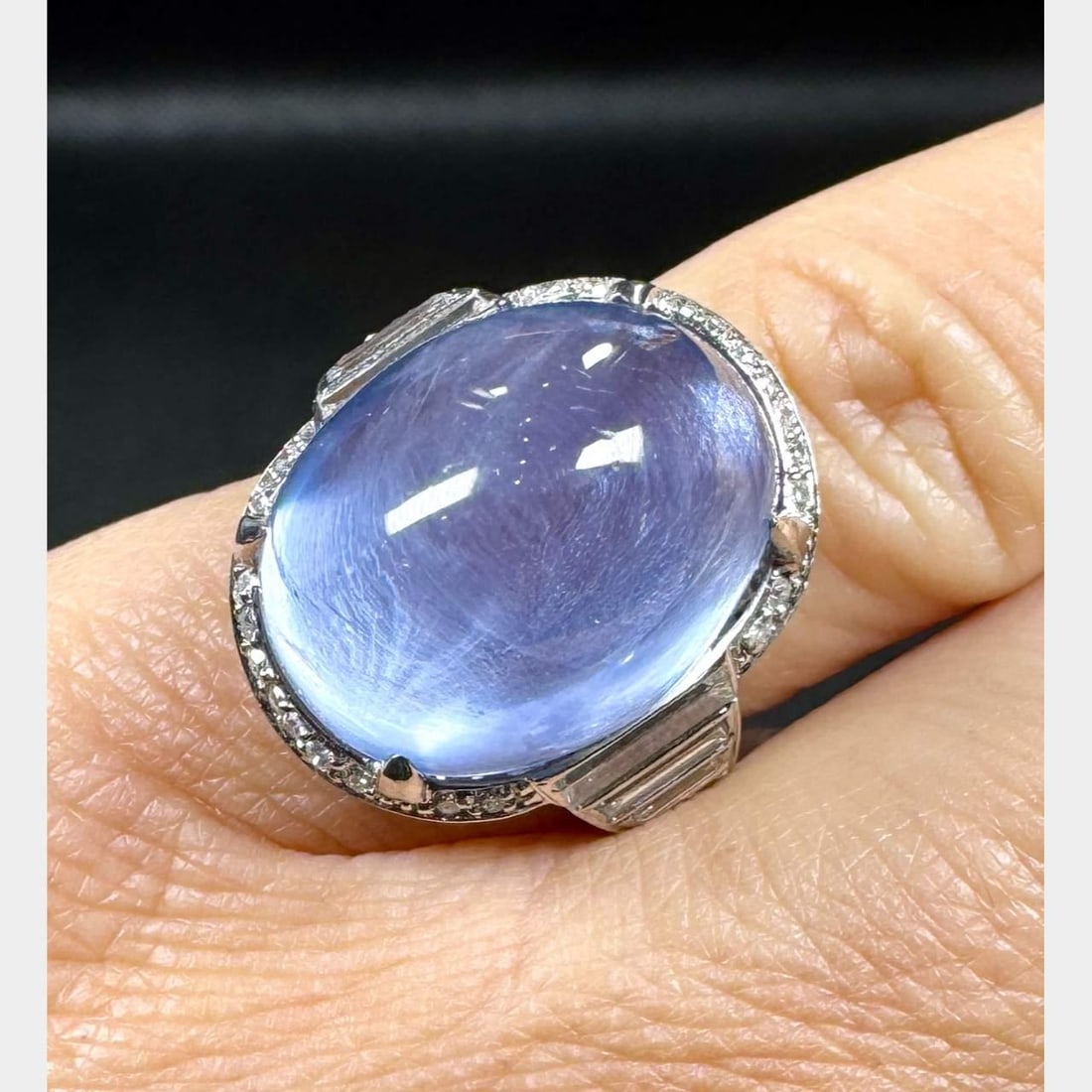Art Deco Platinum 21.30 Ct No-heat Ceylon Star Sapphire Diamond Ring GCS Certified: Art Deco Platinum 21.30 Ct No-heat Ceylon Star Sapphire Diamond Ring GCS Certified This exquisite Art Deco ring features a stunning GCS Certified Ceylon Star Sapphire weighing approximately 21.30 ct,