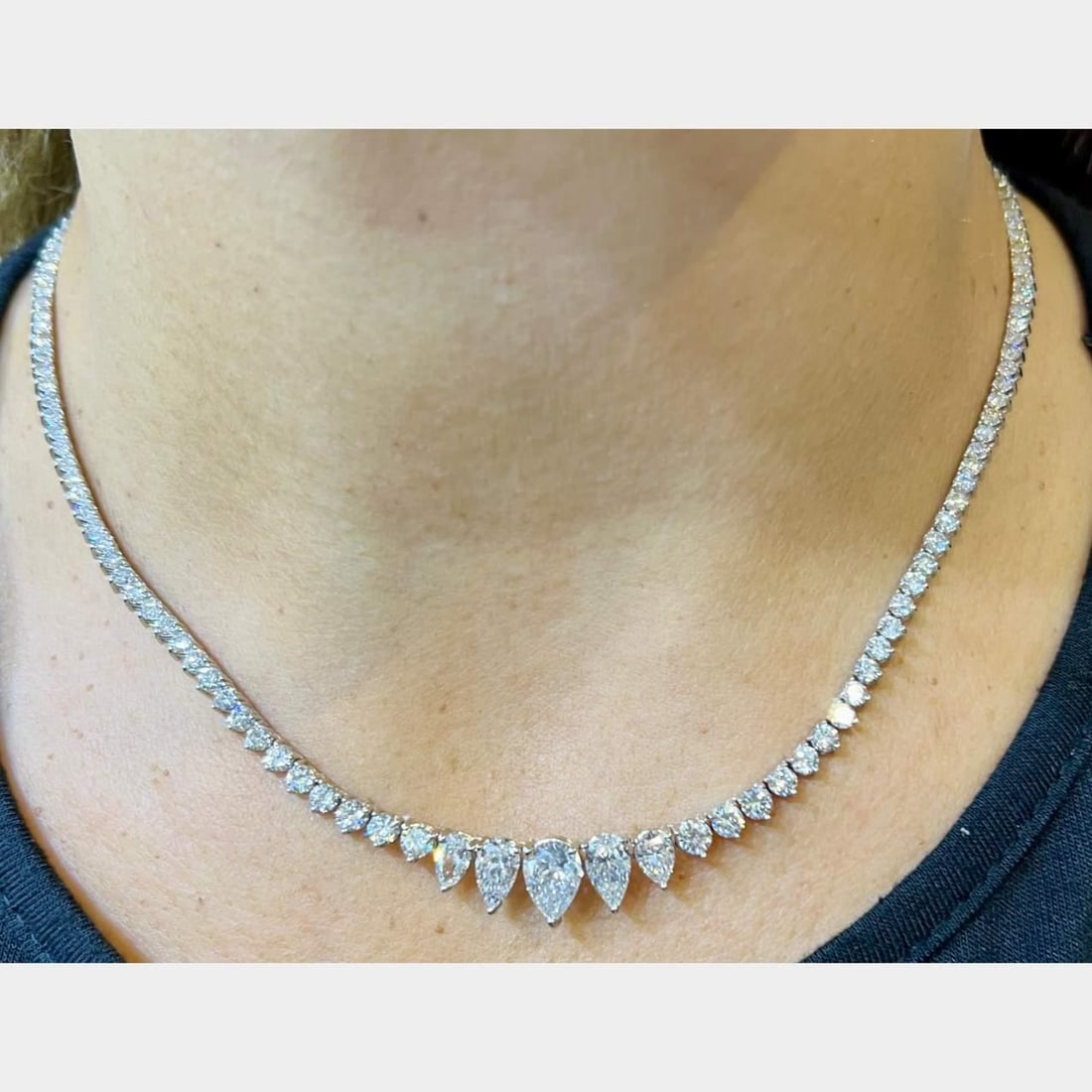 Elegant 14K White Gold 12.70 Ct Diamond Necklace with Pear and Round Diamonds: Elegant 14K White Gold 12.70 Ct Diamond Necklace with Pear and Round Diamonds This stunning 14K White Gold necklace features a total diamond weight of 12.70 carats. The exquisite design includes a 1.3
