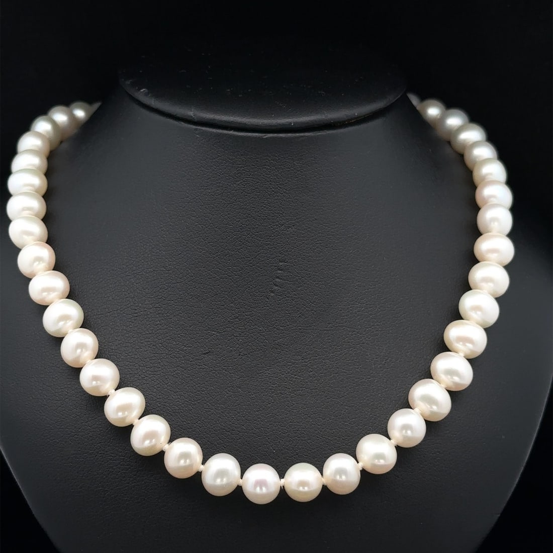 14k Yellow Gold Filigree Clasp 16" Cultured Pearl Necklace: 14k Yellow Gold Filigree Clasp 16" Cultured Pearl Necklace Enhance your jewelry collection with this exquisite 16-inch pearl strand necklace. Featuring (52) genuine cultured pearls in oval and button