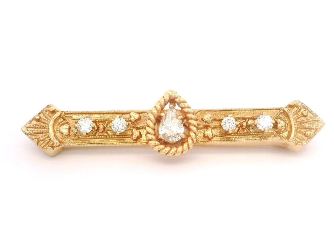 Vintage Victorian Revival 14k Gold Diamond Bar Brooch 0.55ctw: Vintage Victorian Revival 14k Gold Diamond Bar Brooch 0.55ctw This exquisite Vintage Victorian Revival brooch features a stunning combination of diamonds set in 14k yellow gold. The centerpiece is a n