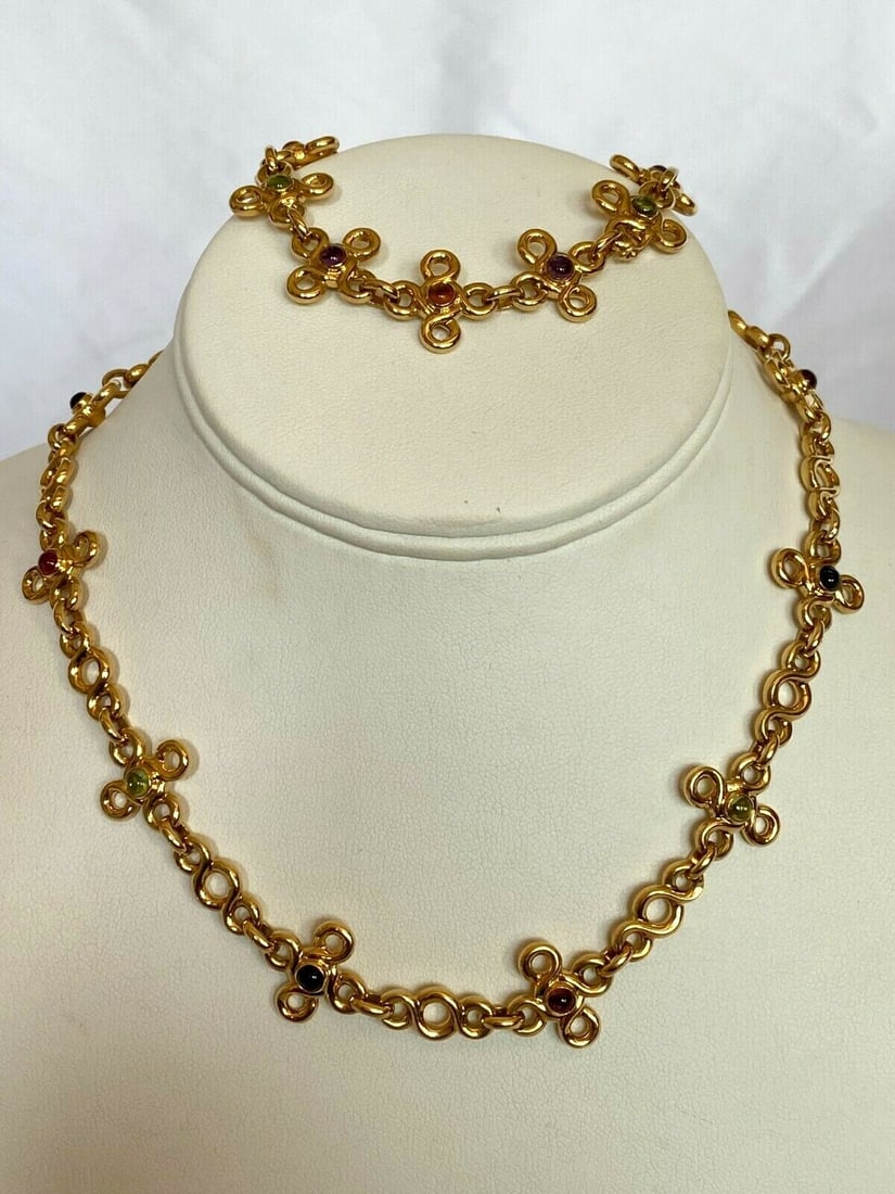 CHANEL 18K Gold Croix Jewelry Set Necklace Bracelet Amethyst Tourmaline Peridot Lolit: CHANEL 18K Gold Croix Jewelry Set Necklace Bracelet Amethyst Tourmaline Peridot Lolit Discover this exquisite jewelry set by Chanel, featuring both a necklace and bracelet crafted from luxurious 18K g