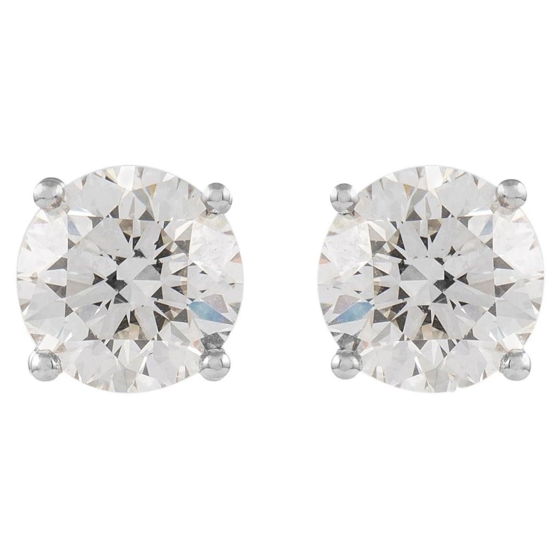 GIA 6.06ct Round Diamond Earrings 18k White Gold: GIA 6.06ct Round Diamond Earrings 18k White Gold Elevate your elegance with these classic stud earrings featuring two exquisite GIA certified round brilliant diamonds totaling 6.06 carats. The diamond