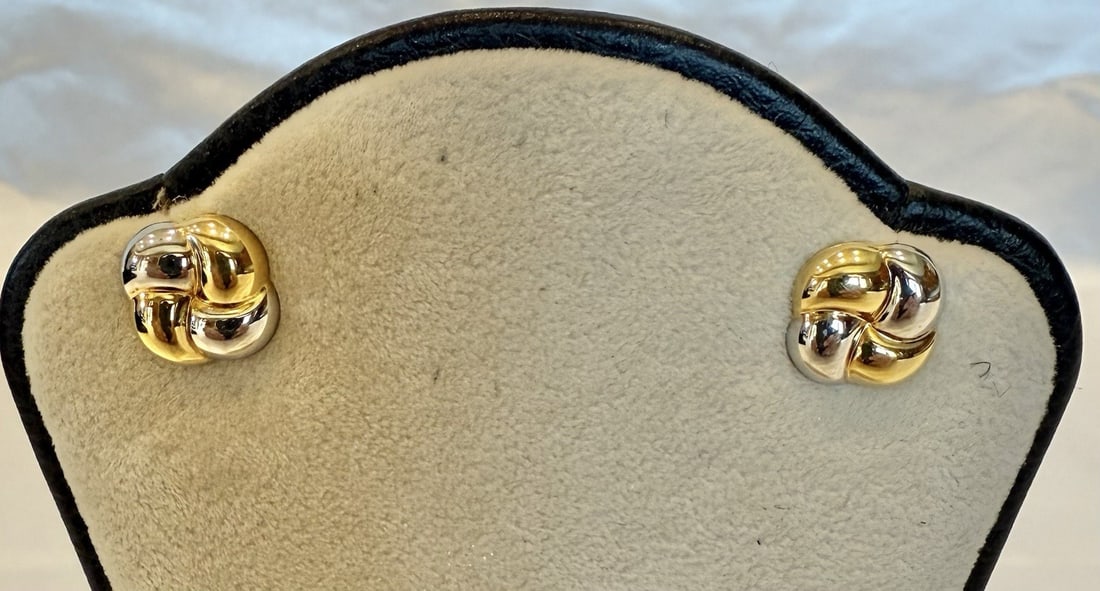 18K Multi-Tone Gold Stud Earrings Fully Signed: 18K Multi-Tone Gold Stud Earrings Fully Signed Elevate your style with this exquisite pair of earrings crafted from 18K yellow and white gold. These stunning stud earrings showcase intricate design an