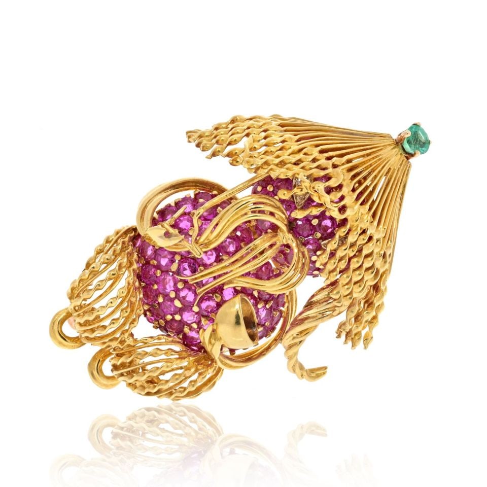 Tiffany & Co. 18K Yellow Gold Jean Schlumberger Noodle Brooch: Tiffany & Co. 18K Yellow Gold Jean Schlumberger Noodle Brooch This exquisite brooch, crafted by Tiffany & Co., showcases a unique design of a man enjoying noodles from a bowl, reflecting the creative