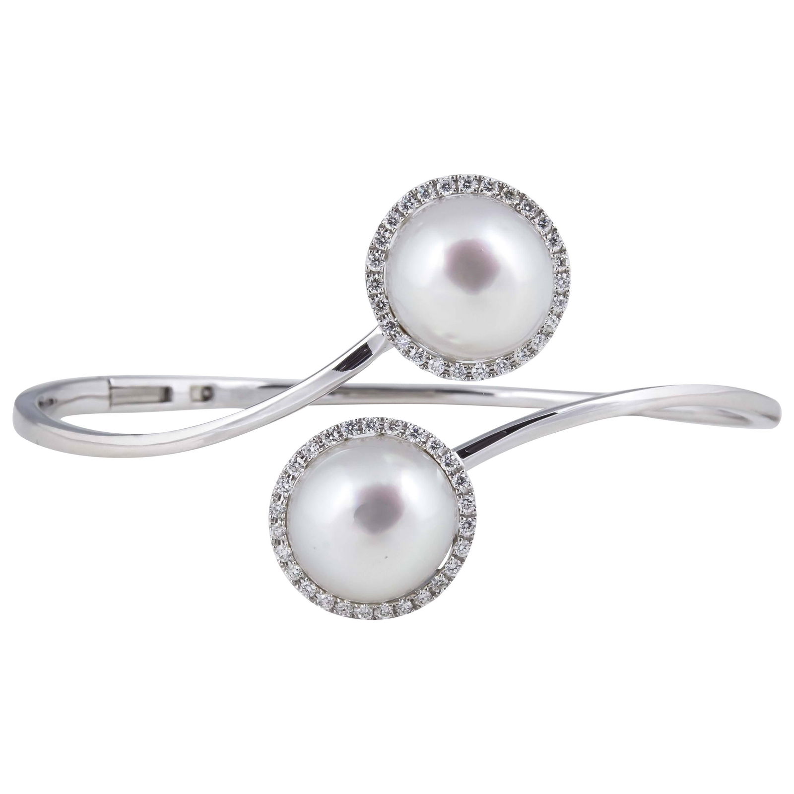 Harbor Diamonds 18K White Gold South Sea Pearl Diamond Bangle Bracelet: Harbor Diamonds 18K White Gold South Sea Pearl Diamond Bangle Bracelet This exquisite 18K White Gold bypass bangle bracelet is a contemporary piece featuring two stunning South Sea Pearls, each measur