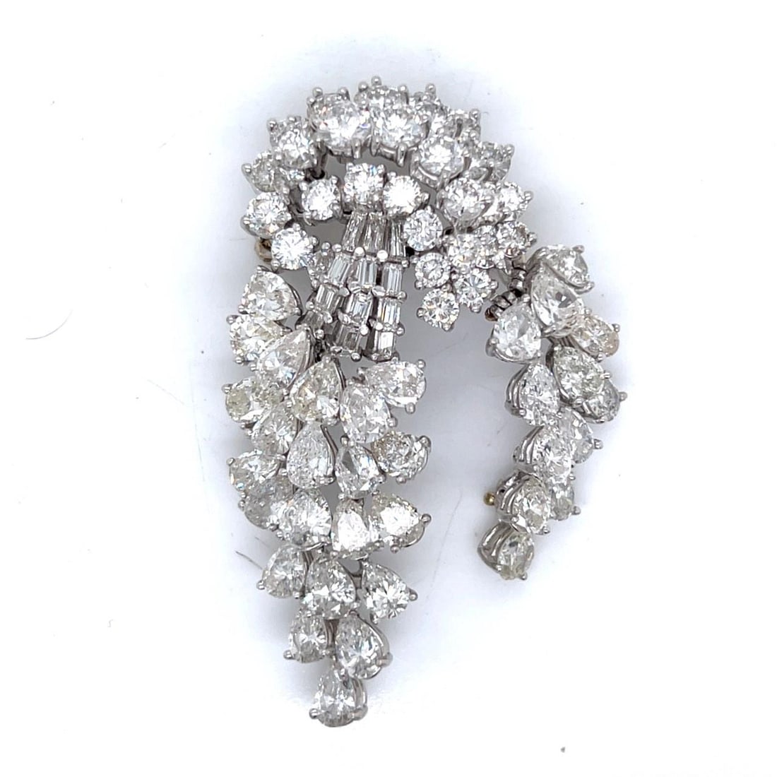 Vintage 1950's Platinum 22.00 Ct Diamond Brooch 34 Pear 12 Baguette 32 Round: Vintage 1950's Platinum 22.00 Ct Diamond Brooch 34 Pear 12 Baguette 32 Round This exquisite 1950's brooch is crafted from luxurious platinum and adorned with a stunning array of diamonds totaling 22.0