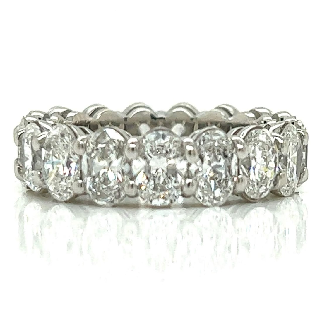 Platinum Eternity Band 8.00 Ct Oval Diamonds F-G VVS-VS: Platinum Eternity Band 8.00 Ct Oval Diamonds F-G VVS-VS This exquisite Platinum Eternity Band features a total of 17 sparkling oval diamonds, collectively weighing approximately 8.00 carats. The diamo