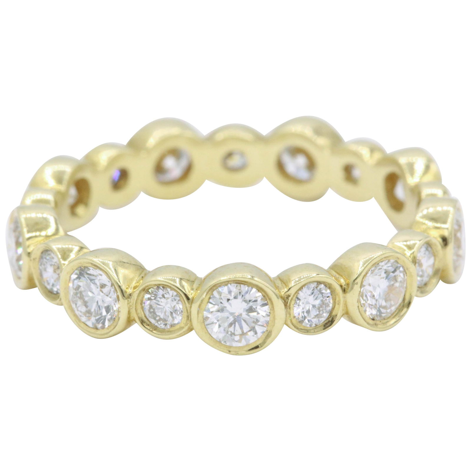 Harbor Diamonds 18k Gold Bubble Band with 1.29 Carat Diamonds: Harbor Diamonds 18k Gold Bubble Band with 1.29 Carat Diamonds This exquisite Gold Diamond 'Bubble' Band showcases a contemporary design crafted from 18k gold. The ring features a total of 18 round bri