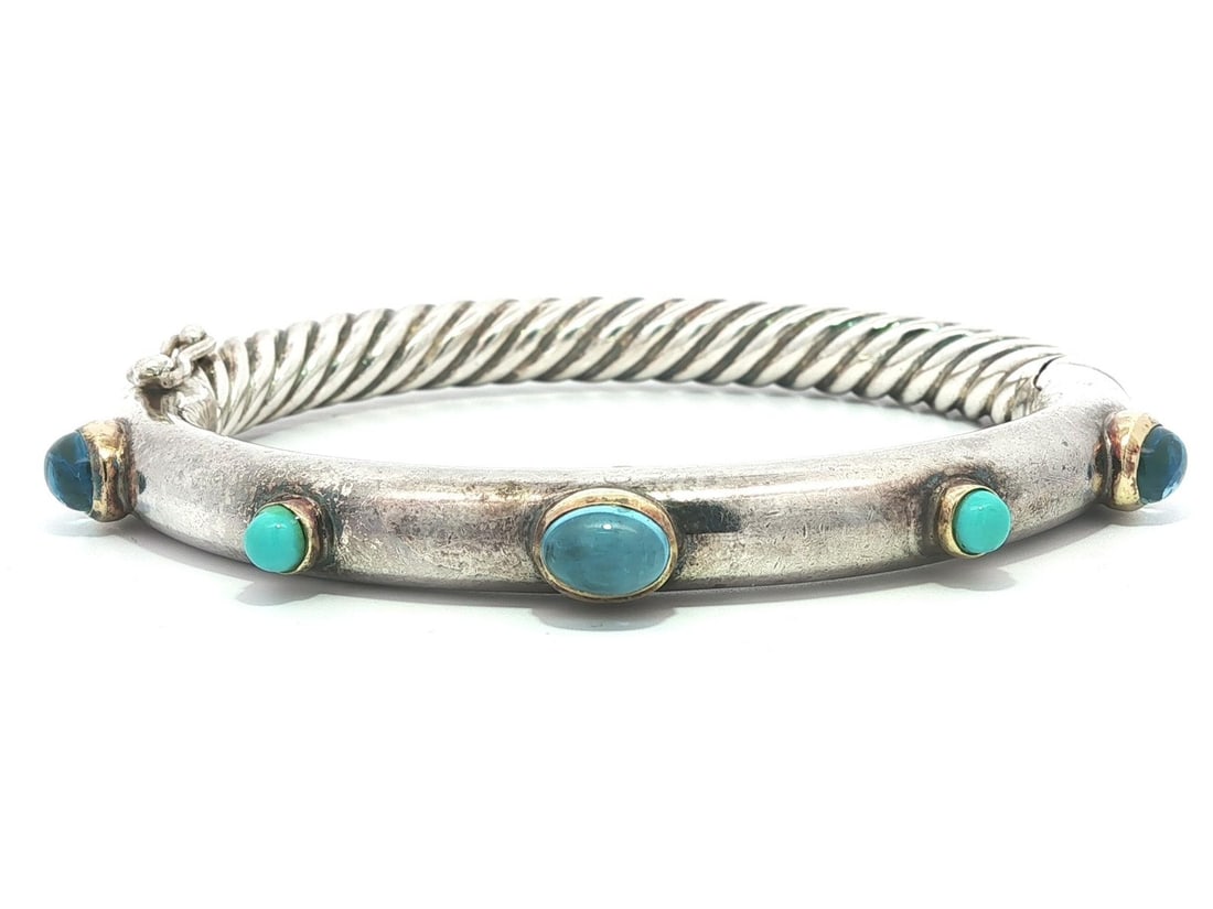 David Yurman Vintage Cable Bangle Bracelet with Blue Topaz and Turquoise: David Yurman Vintage Cable Bangle Bracelet with Blue Topaz and Turquoise This exquisite vintage bangle bracelet by David Yurman showcases a captivating design featuring three natural genuine blue topa