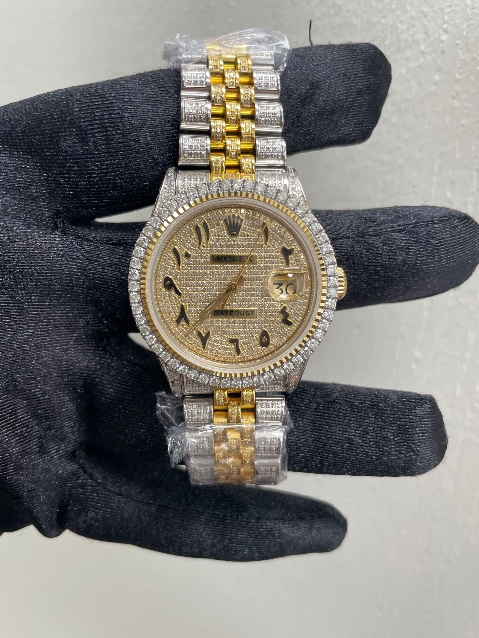 Rolex Datejust 1601 Diamond Arabic Dial YG-SS After Market Jubilee Bracelet: Rolex Datejust 1601 Diamond Arabic Dial YG-SS After Market Jubilee Bracelet This exquisite Rolex Datejust features a stunning Diamond Arabic dial, elegantly encased in a 36mm size. The watch is adorne