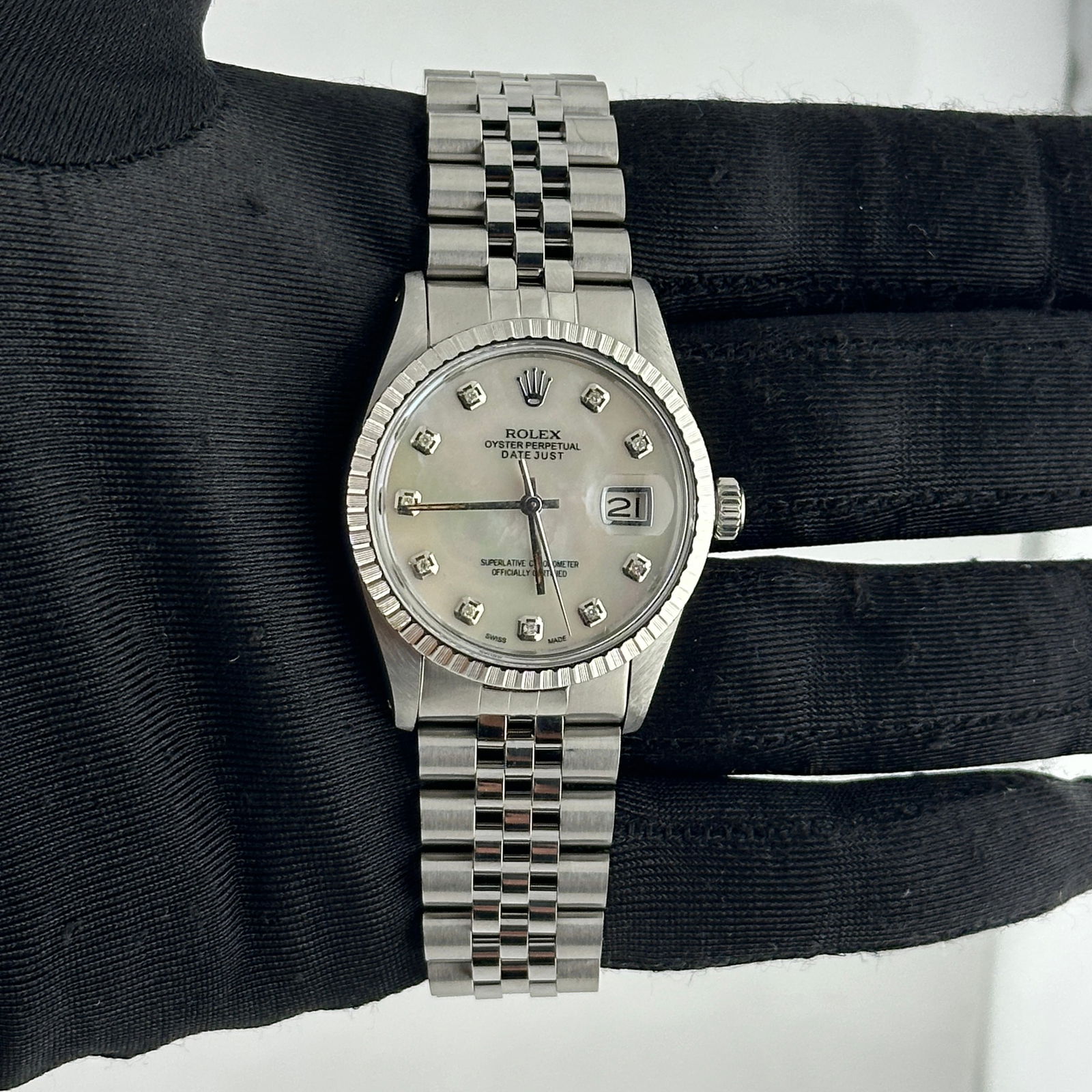 Rolex Datejust 16014 White MOP Diamond Dial Jubilee Bracelet: Rolex Datejust 16014 White MOP Diamond Dial Jubilee Bracelet This Rolex Datejust features a classic silver stick dial, complemented by a fluted bezel and a stylish Jubilee bracelet. Designed for men,