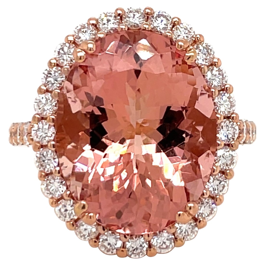 Contemporary 18K Rose Gold Oval Morganite Diamond Halo Ring 12.99 Carats: Contemporary 18K Rose Gold Oval Morganite Diamond Halo Ring 12.99 Carats This exquisite Oval Cut Morganite Diamond Halo Cocktail Ring is a stunning blend of elegance and contemporary design. Crafted f