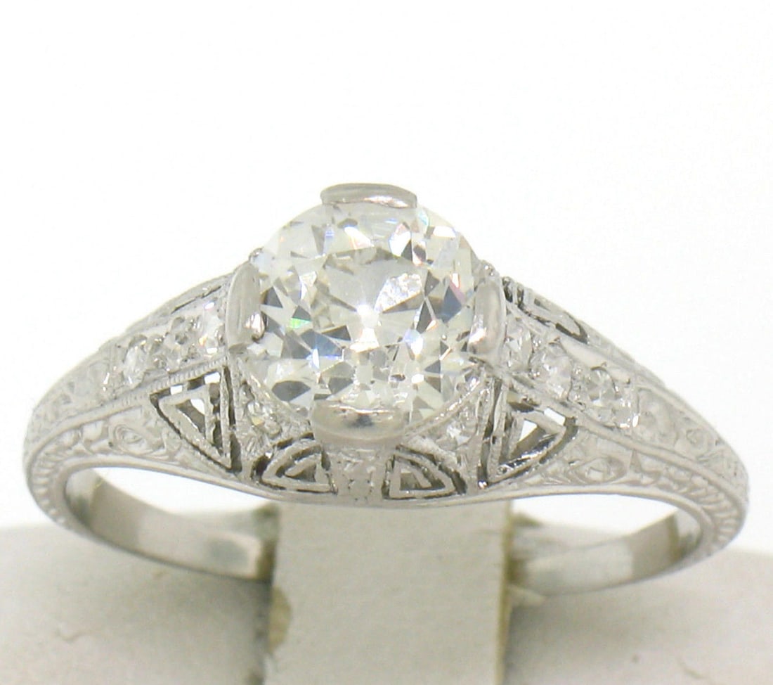 Antique Art Deco Platinum 1.30ctw GIA Certified Diamond Engagement Ring: Antique Art Deco Platinum 1.30ctw GIA Certified Diamond Engagement Ring This exquisite Antique Art Deco Engagement Ring features a stunning 1.30 carat total weight of diamonds, meticulously crafted in