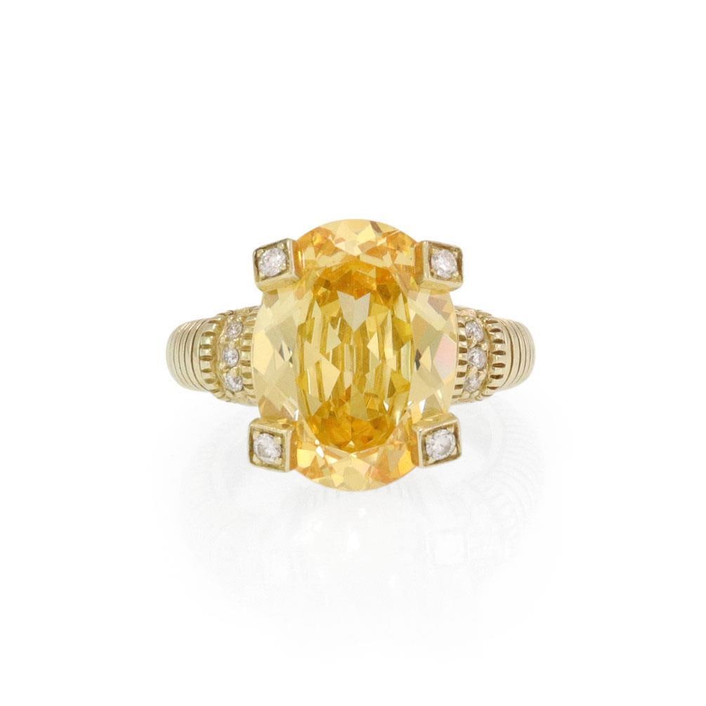 Judith Ripka 14k Yellow Gold Ring with Citrine and Diamonds Size 6: Judith Ripka 14k Yellow Gold Ring with Citrine and Diamonds Size 6 This exquisite ring by Judith Ripka showcases a stunning oval-shaped yellow citrine gemstone, measuring 16mm long by 12mm wide, beaut