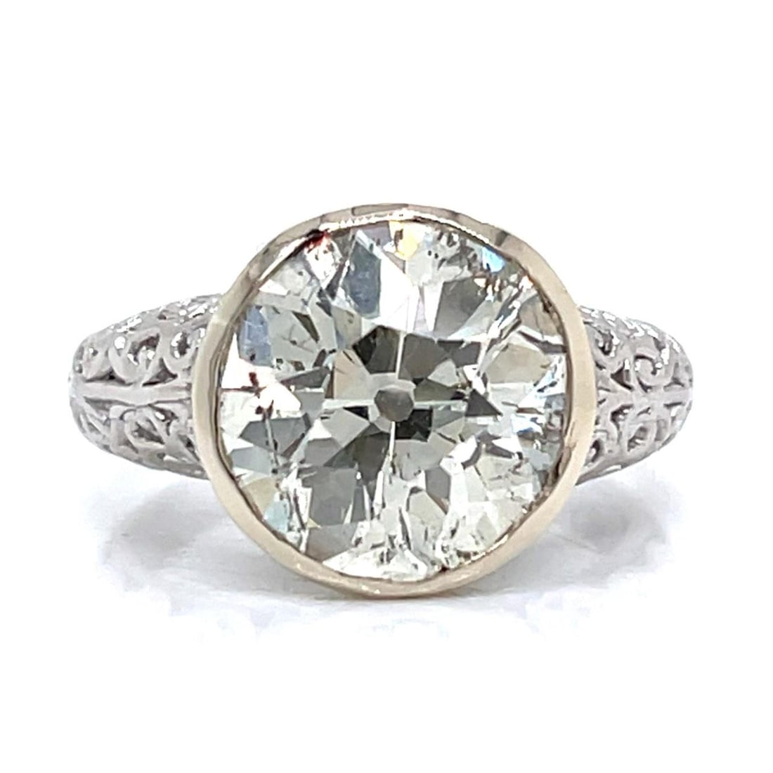 Art Deco Platinum 6.14 Ct Diamond Engagement Ring: Art Deco Platinum 6.14 Ct Diamond Engagement Ring This exquisite Art Deco ring features a stunning 6.14 Ct. diamond, showcasing L-M color and SI3 clarity. Crafted in platinum, the ring weighs 9.4 gram