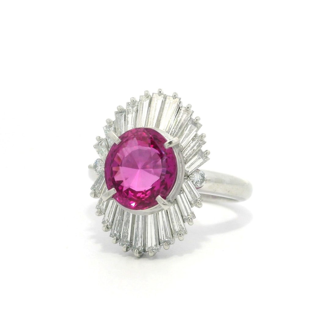 Vintage Platinum GIA Certified 4.67ctw Pink Sapphire Diamond Ring: Vintage Platinum GIA Certified 4.67ctw Pink Sapphire Diamond Ring This exquisite vintage cocktail ring showcases a breathtaking natural pink sapphire, weighing 3.24 carats, set in solid platinum. The