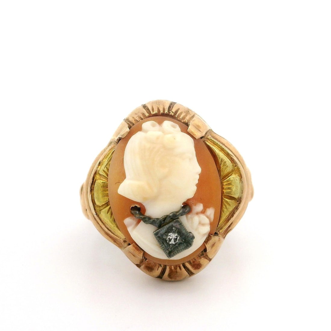 Antique 10k Gold Cameo Ring with Diamond Necklace Detail: Antique 10k Gold Cameo Ring with Diamond Necklace Detail This exquisite Antique Multi Tone Gold Female Portrait Ring features a beautifully carved natural cameo shell, bezel set in a combination of 10