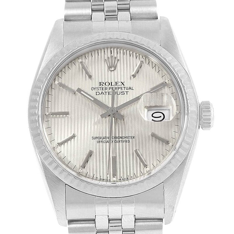 Rolex Datejust 16014 Silver Tapestry Dial Jubilee Bracelet: Rolex Datejust 16014 Silver Tapestry Dial Jubilee Bracelet Presenting a stunning Rolex Datejust featuring a captivating Silver Tapestry Dial, elegantly paired with a Jubilee bracelet. This classic tim