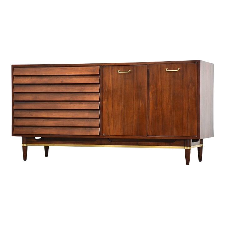 1960s Merton Gershun Walnut Dresser American of Martinsville Dania Collection: 1960s Merton Gershun Walnut Dresser American of Martinsville Dania Collection This exquisite mid-century modern dresser, designed by Merton Gershun for the American of Martinsville Dania Collection, s
