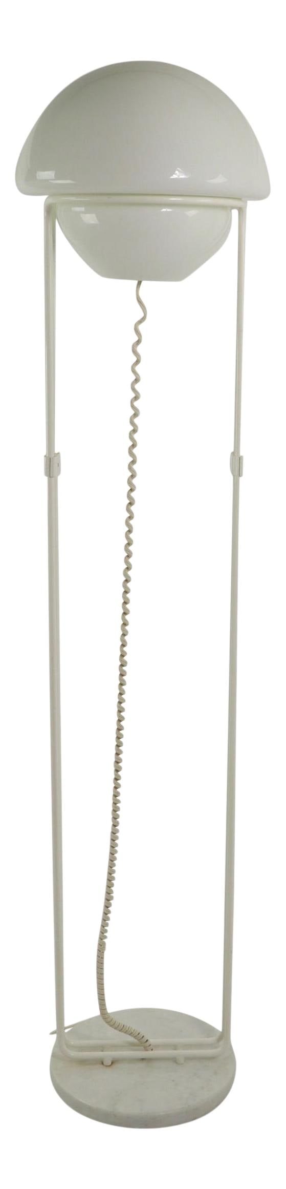 Italian Modernist Floor Lamp Marble Base Glass Shade 66": Italian Modernist Floor Lamp Marble Base Glass Shade 66" Elevate your space with this chic Italian modernist floor lamp, inspired by the designs of Fabio Lenci for Harvey Guzzini. This stunning piece