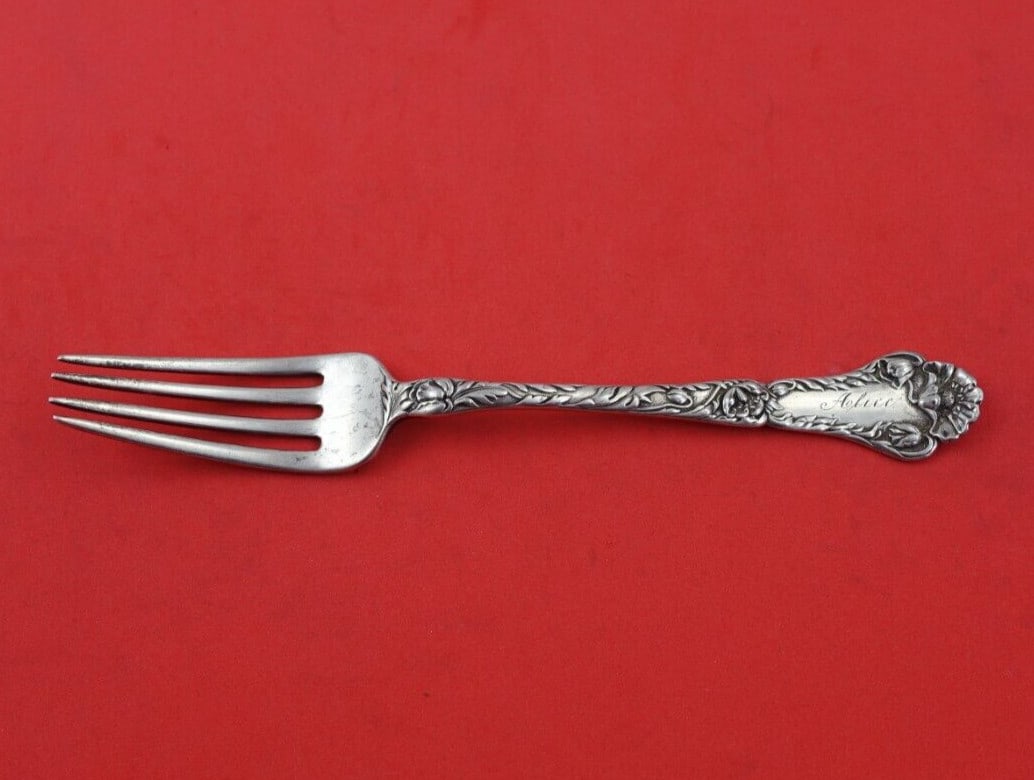 Gorham Poppy Sterling Silver 6 Inch Junior Fork Child's Silverware: Gorham Poppy Sterling Silver 6 Inch Junior Fork Child's Silverware Discover a charming heirloom piece from Gorham, the Poppy Junior Fork. Crafted from high-quality sterling silver, this 6" fork featur