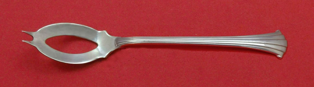 Gorham Newport Scroll Sterling Silver Olive Spoon 5 3/4 Custom Made: Gorham Newport Scroll Sterling Silver Olive Spoon 5 3/4 Custom Made This exquisite serving spoon is crafted from sterling silver and features the elegant Newport Scroll pattern by Gorham. At a length