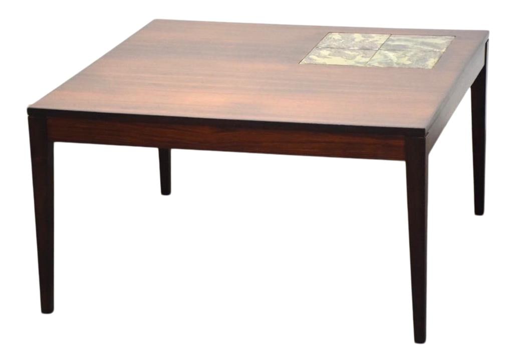 Mid Century Modern Rosewood Coffee Table with Tile Insert: Mid Century Modern Rosewood Coffee Table with Tile Insert This mid-century modern coffee table features a stunning rosewood finish and a stylish tile insert, making it a perfect addition to any contem