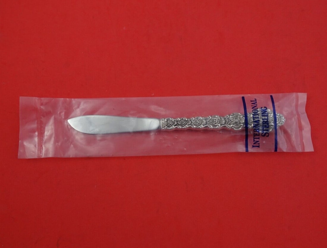 International Sterling Silver King Louis Butter Spreader 6.5 Inch New: International Sterling Silver King Louis Butter Spreader 6.5 Inch New Enhance your dining experience with this exquisite butter spreader from the King Louis pattern by International Sterling. Crafted 