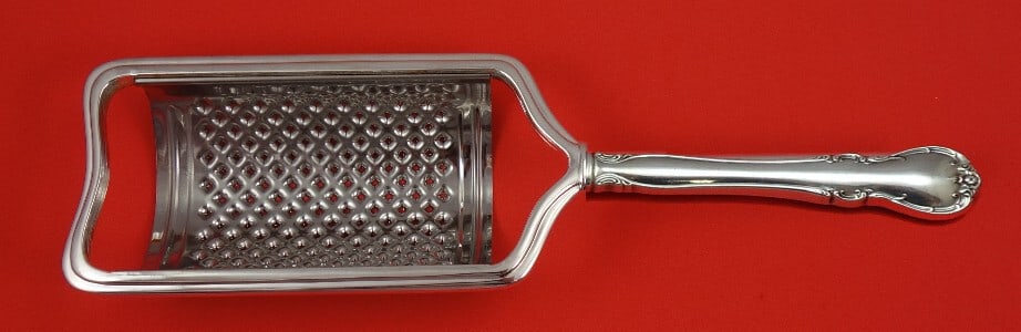 Towle French Provincial Sterling Silver Custom Cheese Grater 8.5 Inches: Towle French Provincial Sterling Silver Custom Cheese Grater 8.5 Inches Add a touch of elegance to your serving collection with this custom-made cheese grater from the French Provincial pattern by Tow