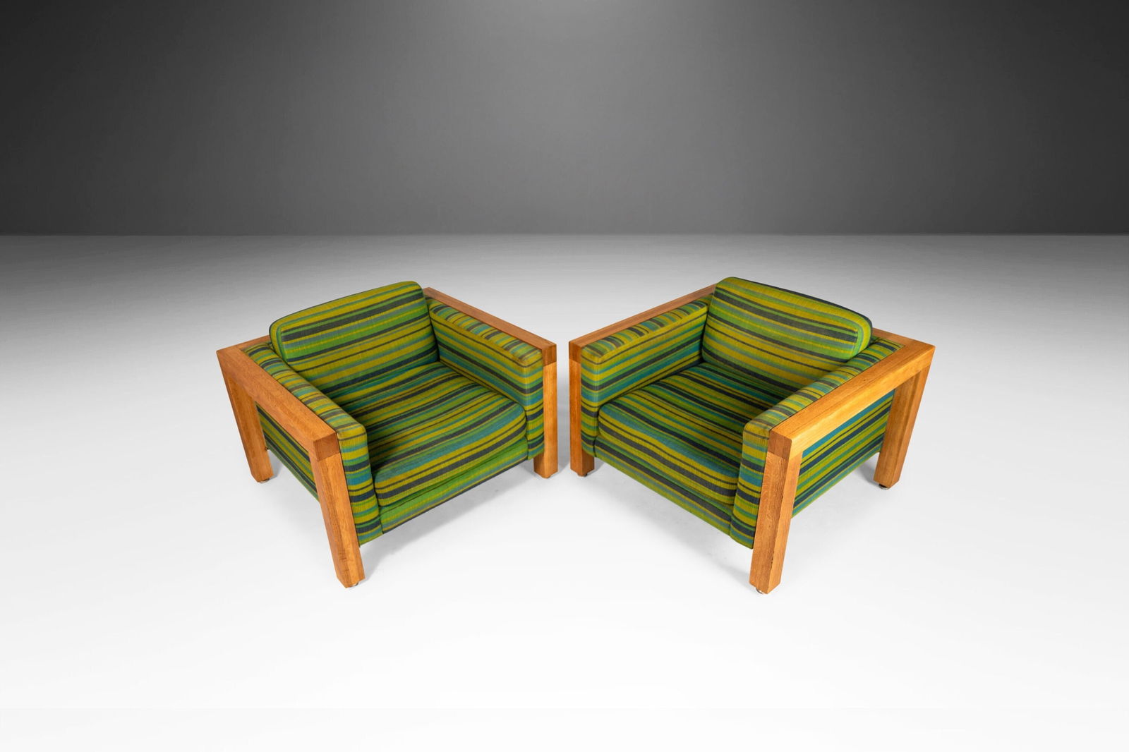 Pair of 1970s Modernist Cube Chairs After George Nelson for Herman Miller: Pair of 1970s Modernist Cube Chairs After George Nelson for Herman Miller This striking set of two substantial Modernist cube chairs, designed in the manner of George Nelson for Herman Miller, feature