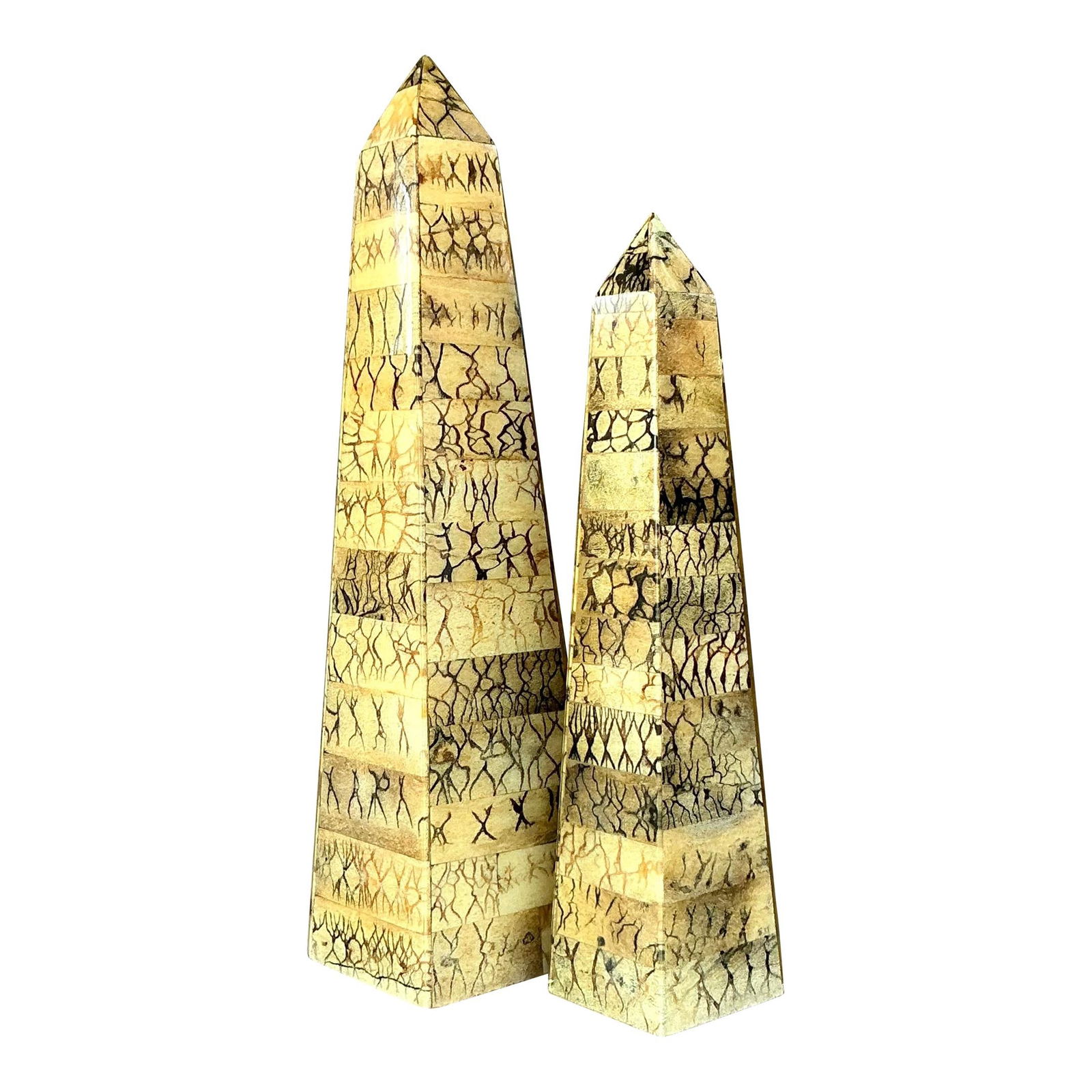 Vintage Coconut Shell Obelisks Set of 2 with Tribal Motifs: Vintage Coconut Shell Obelisks Set of 2 with Tribal Motifs Enhance your living space with this striking set of two vintage coconut shell obelisks. Featuring a captivating pattern of natural coconut sh