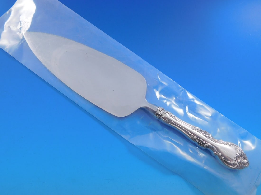 Gorham Melrose Sterling Silver Cake Server 10 1/4 Inch: Gorham Melrose Sterling Silver Cake Server 10 1/4 Inch The Melrose cake server by Gorham features a hollow handle crafted from sterling silver, paired with a durable stainless steel blade. This exquis