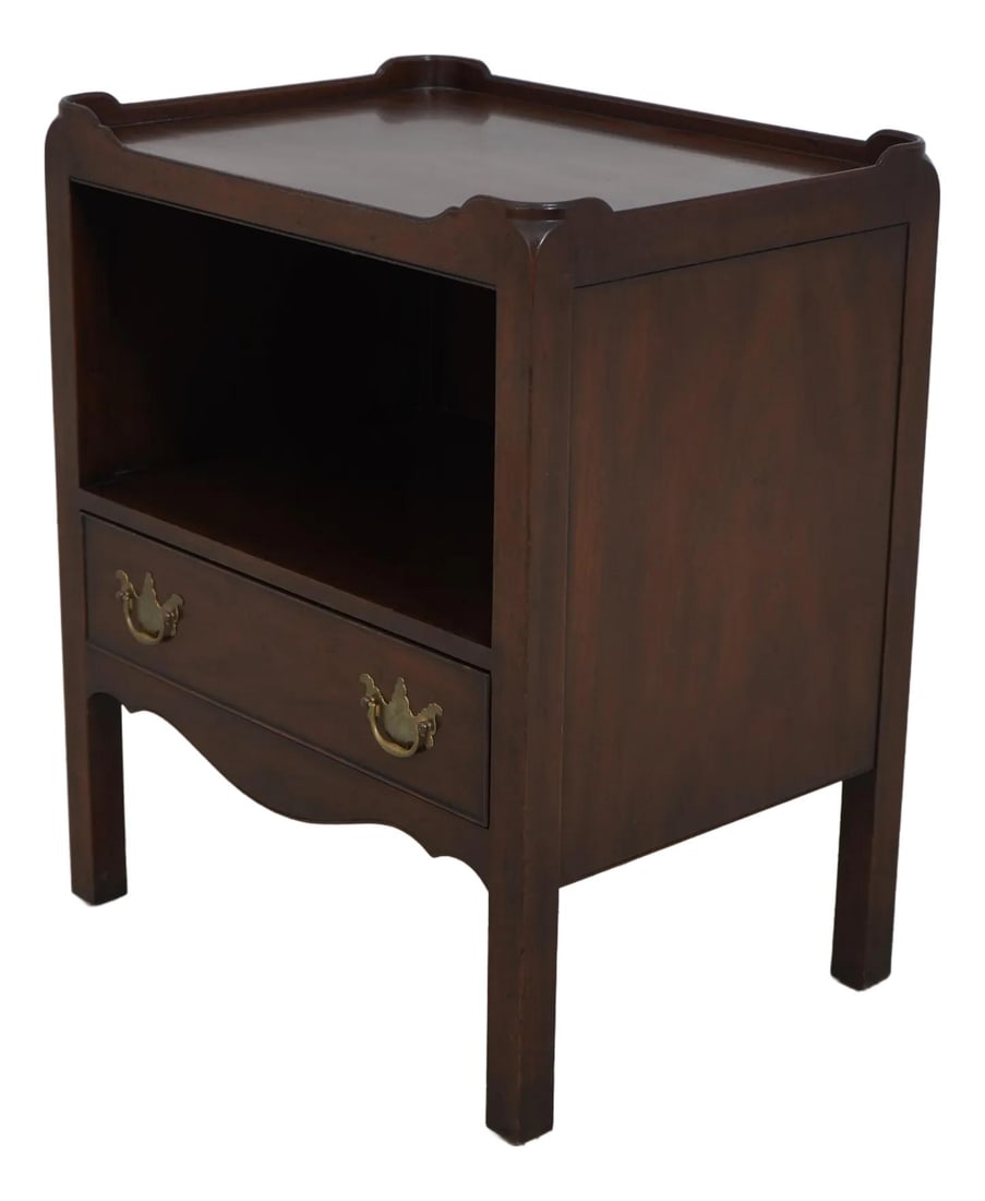 Kittinger Chippendale Mahogany Nightstand with Brass Hardware: Kittinger Chippendale Mahogany Nightstand with Brass Hardware This elegant Kittinger Mahogany Nightstand Commode features a single dovetailed drawer and is crafted in the timeless Chippendale style. W