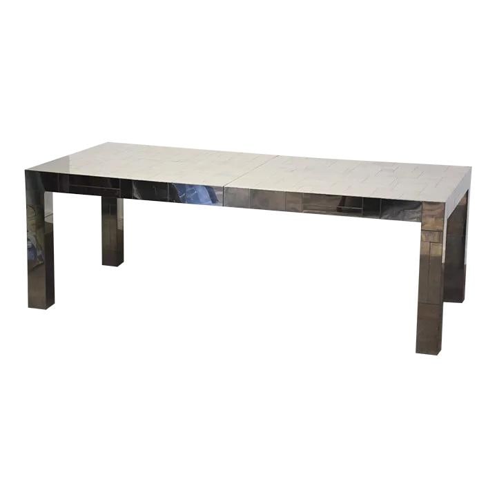 Paul Evans Mid-Century Modern Chrome Dining Table with Extensions: Paul Evans Mid-Century Modern Chrome Dining Table with Extensions This stunning mid-century modern dining table, designed by Paul Evans, features a sleek chrome finish that adds a touch of elegance to
