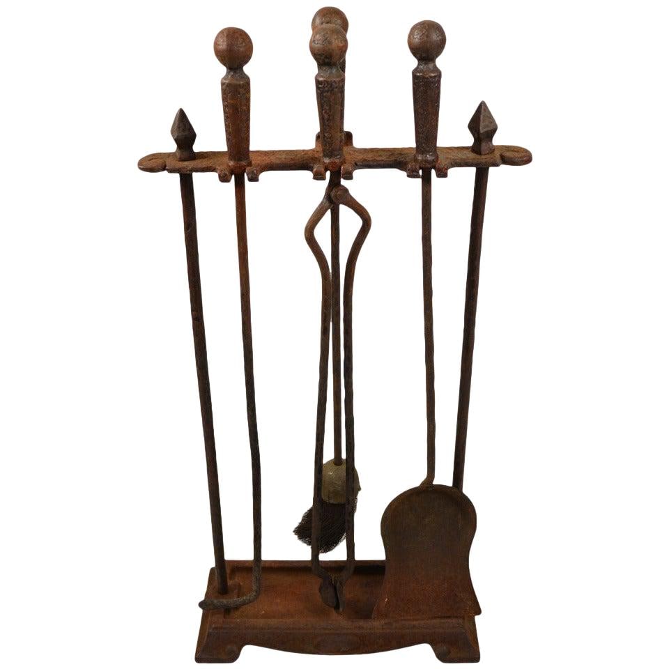 Cahill Five Piece Arts & Crafts Fireplace Tool Set: Cahill Five Piece Arts & Crafts Fireplace Tool Set Enhance your fireplace with this five-piece Arts & Crafts fireplace tool set, featuring a brush, tongs, shovel, poker, and a sturdy stand. This compl
