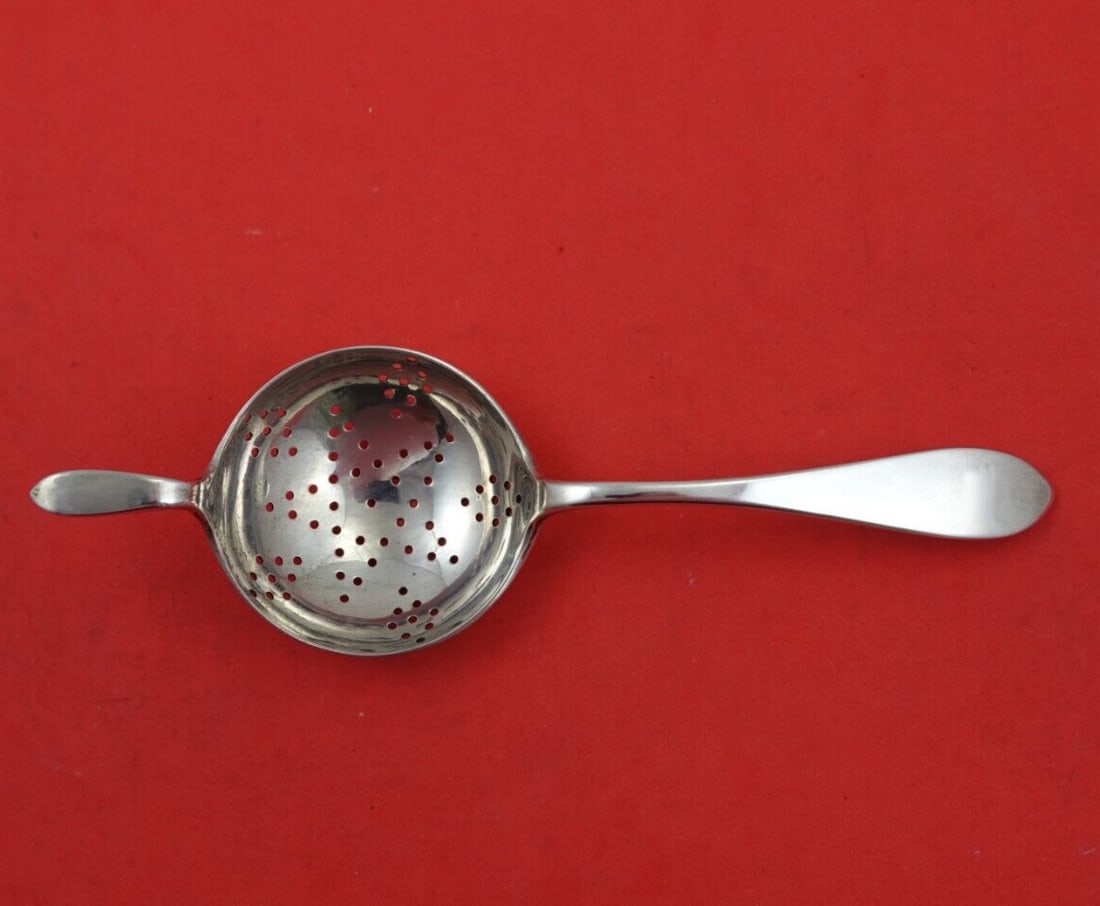 Old Newbury Crafters Sterling Silver Tea Strainer 6 3/4 inches 1800-1849: Old Newbury Crafters Sterling Silver Tea Strainer 6 3/4 inches 1800-1849 This exquisite tea strainer, crafted by Old Newbury Crafters, showcases the timeless elegance of the Old Newbury pattern. Made