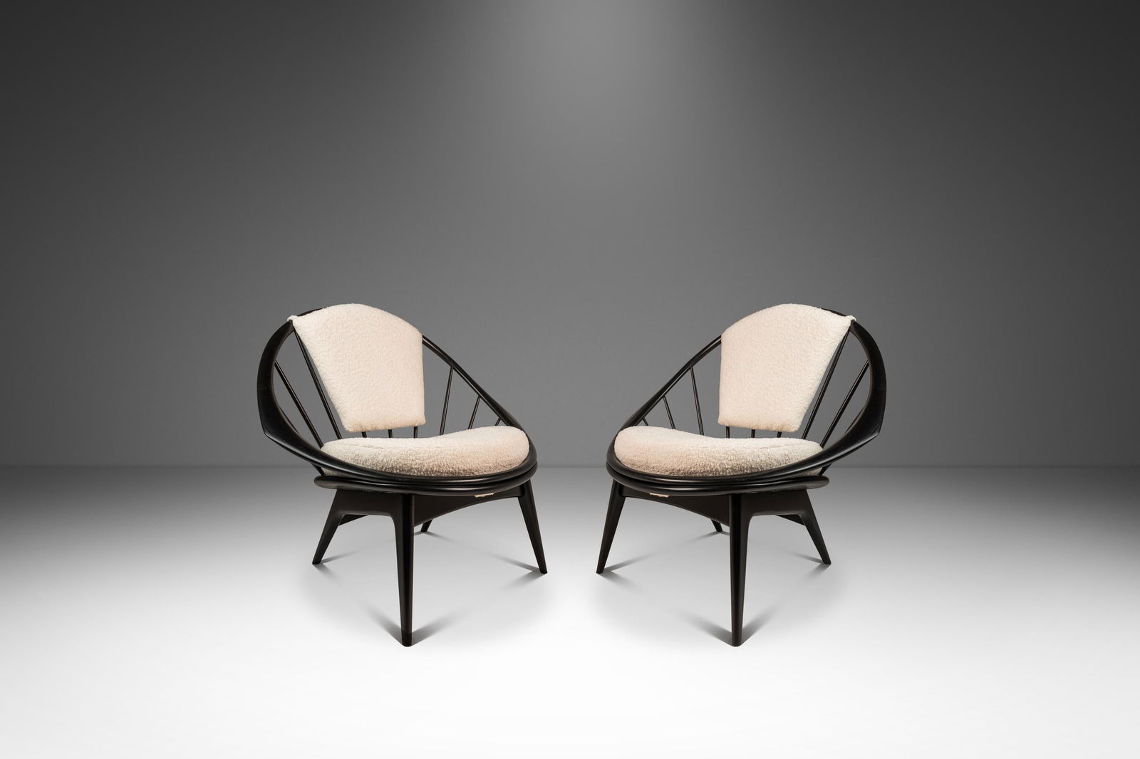 Set of Two Ib Kofod-Larsen Danish Mid-Century Modern Chairs in Boucle: Set of Two Ib Kofod-Larsen Danish Mid-Century Modern Chairs in Boucle Introducing a stunning set of two Danish Mid-Century Modern "Hoop" or "Peacock" chairs designed by Ib Kofod-Larsen for Selig, Denm