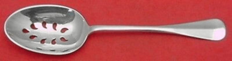 Stieff Queen Anne-Williamsburg Sterling Silver Pierced Serving Spoon: Stieff Queen Anne-Williamsburg Sterling Silver Pierced Serving Spoon This exquisite pierced serving spoon is crafted in the Queen Anne-Williamsburg pattern by Stieff. Made from sterling silver, this c