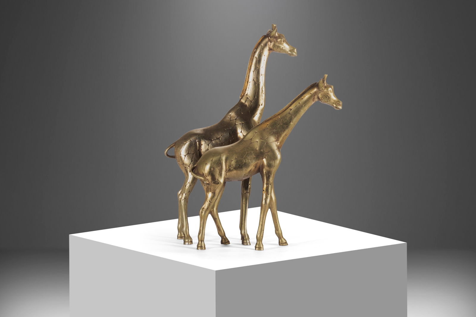 Mid Century Solid Brass Giraffe Sculptures Set of 2 Korea: Mid Century Solid Brass Giraffe Sculptures Set of 2 Korea This stunning set of two artisan hand-hammered giraffe figures in solid brass is a perfect addition to any home decor. Crafted in South Korea