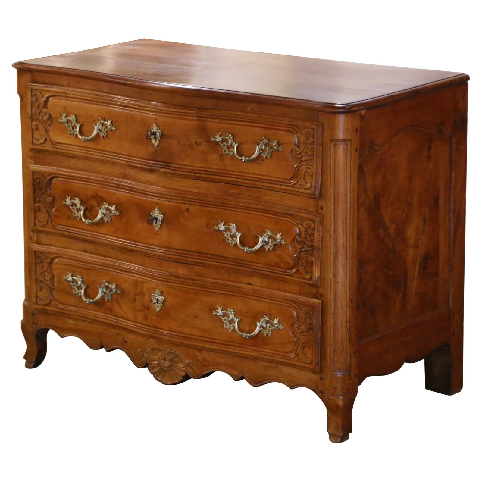 18th Century French Louis XV Carved Elm Chestnut Commode Chest: 18th Century French Louis XV Carved Elm Chestnut Commode Chest Discover the charm of the 18th Century with this exquisite Louis XV Carved Elm and Chestnut Three-Drawer Commode Chest. Crafted in Lyon,
