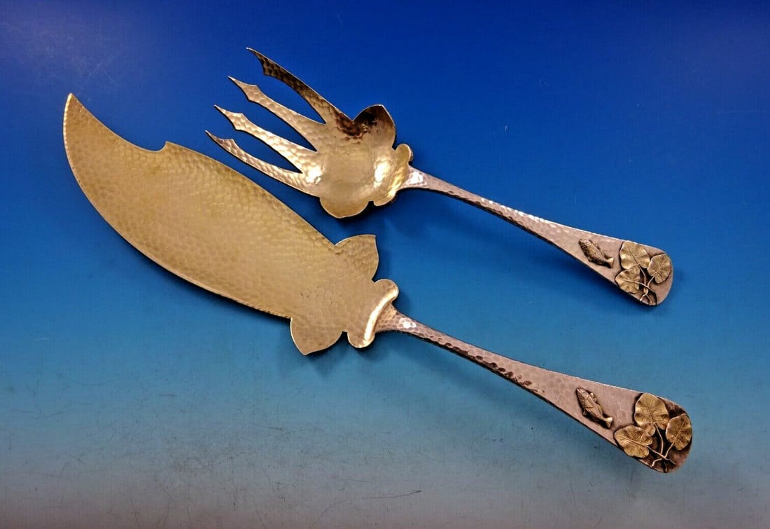 Duhme 2-Pc Sterling Silver Fish Serving Set Hammered Aesthetic 1880s: Duhme 2-Pc Sterling Silver Fish Serving Set Hammered Aesthetic 1880s This exceptional 2-piece fish serving set from Duhme showcases exquisite craftsmanship in sterling silver with a gold-washed finish