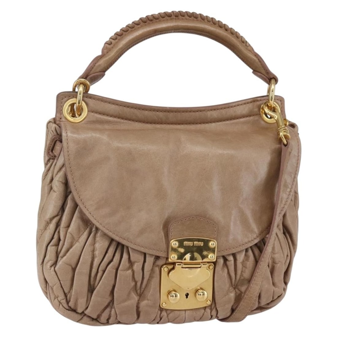 Miu Miu Pink Gold Leather Matelasse Shoulder Bag 2Way Auth: Miu Miu Pink Gold Leather Matelasse Shoulder Bag 2Way Auth This stylish Miu Miu Matelasse Shoulder Bag is crafted from high-quality leather, showcasing a chic pink and gold color combination. It featu