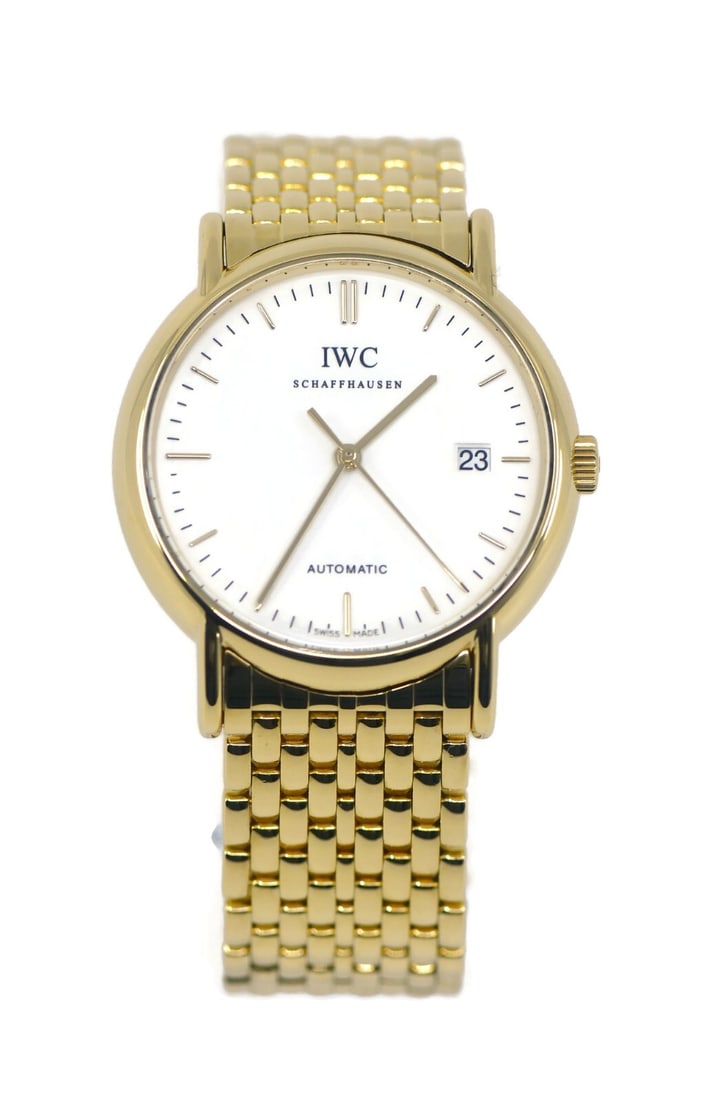 IWC Portofino IW925101 18K Yellow Gold Automatic Watch with Box and Papers: IWC Portofino IW925101 18K Yellow Gold Automatic Watch with Box and Papers The IWC Portofino IW925101 is a luxurious wristwatch crafted from 18K yellow gold, featuring a classic analog display with a