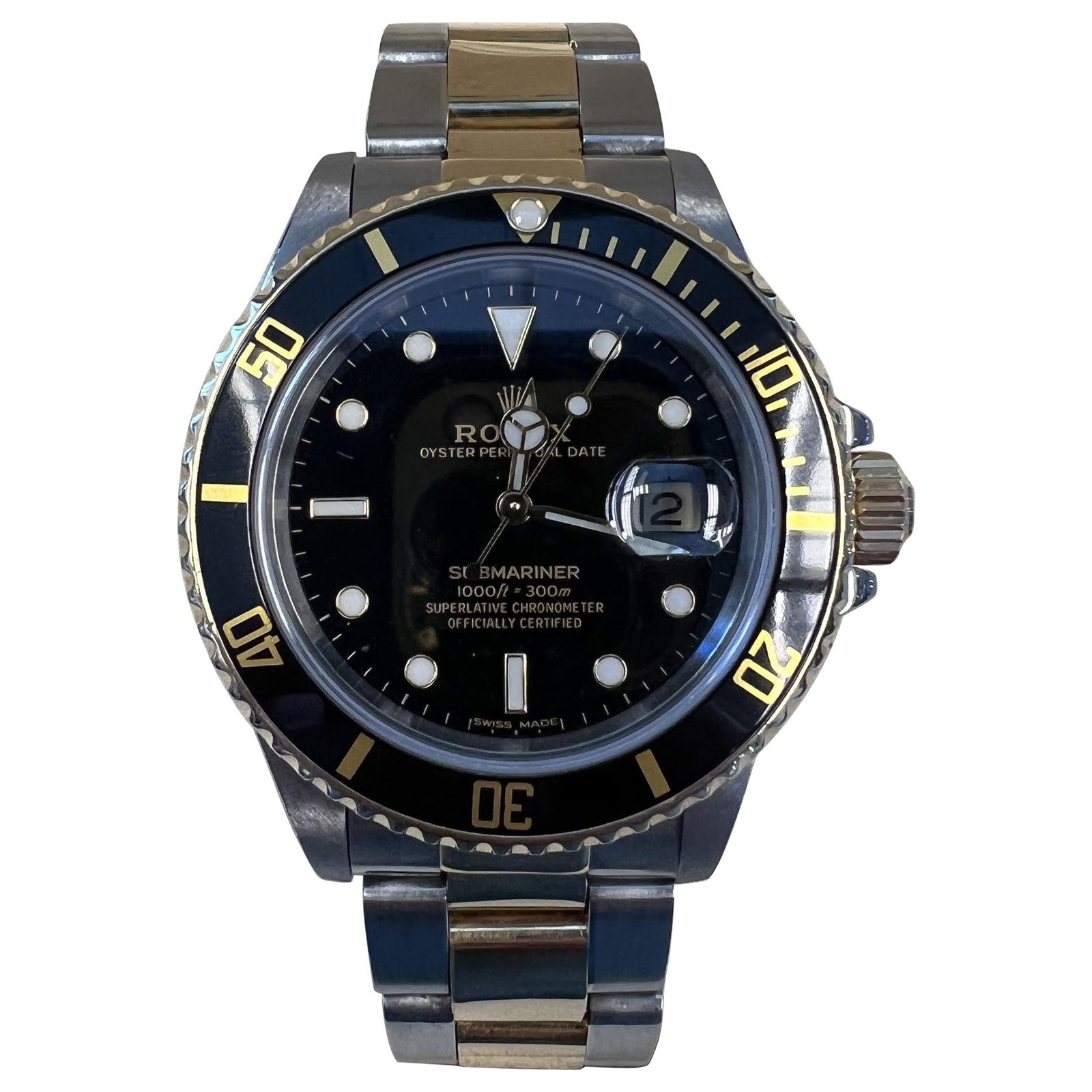 Rolex Submariner Date 16803 Two Tone Black Dial with 2021 Service Papers: Rolex Submariner Date 16803 Two Tone Black Dial with 2021 Service Papers This exquisite Rolex Submariner Date features a stunning two-tone design, combining 18k yellow gold and stainless steel for a l