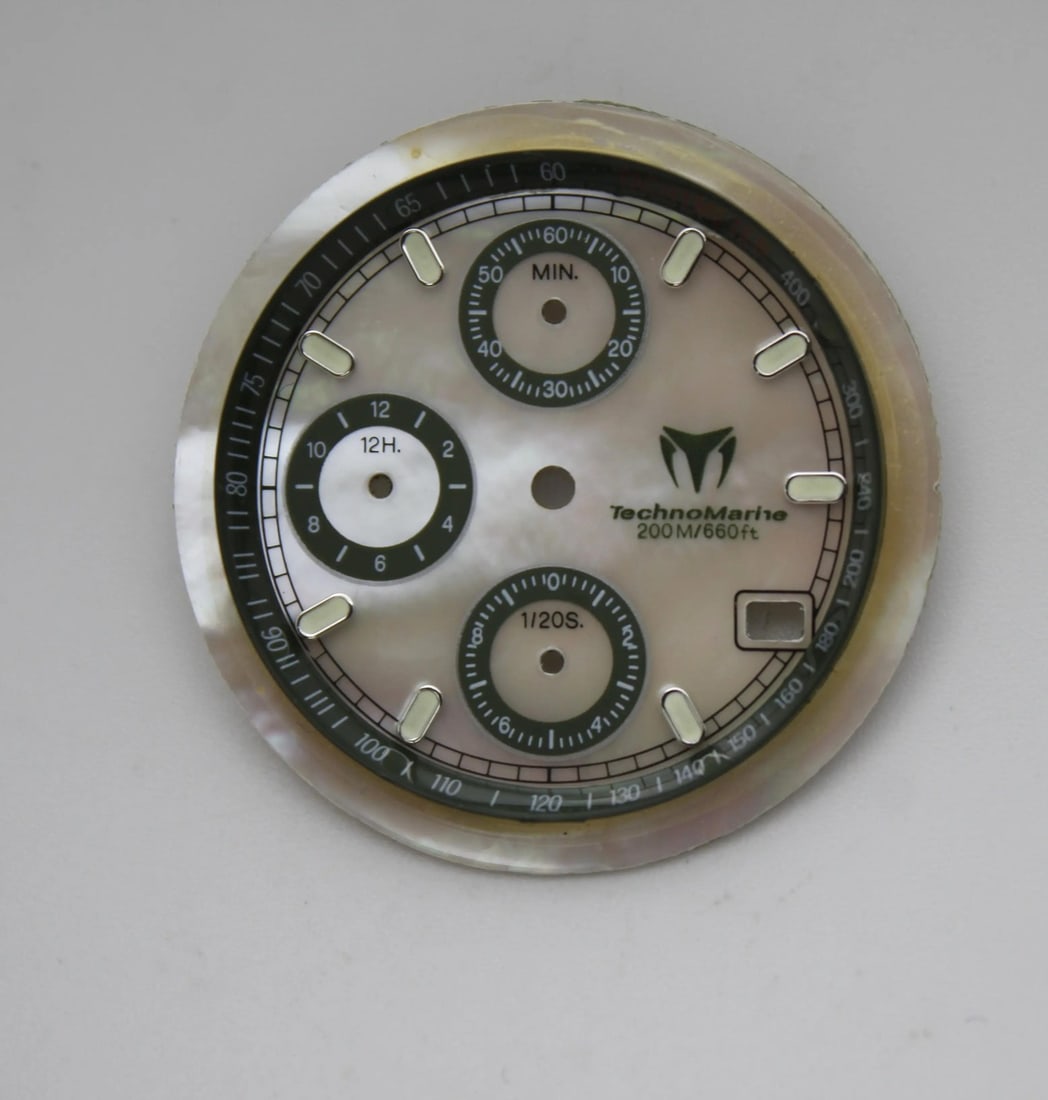 Technomarine Cruise 30mm Mother of Pearl Gray Dial for Men's Watch: Technomarine Cruise 30mm Mother of Pearl Gray Dial for Men's Watch Upgrade your Technomarine Cruise watch with this high-quality 30mm Mother of Pearl dial featuring striking green sub-dials. Designed